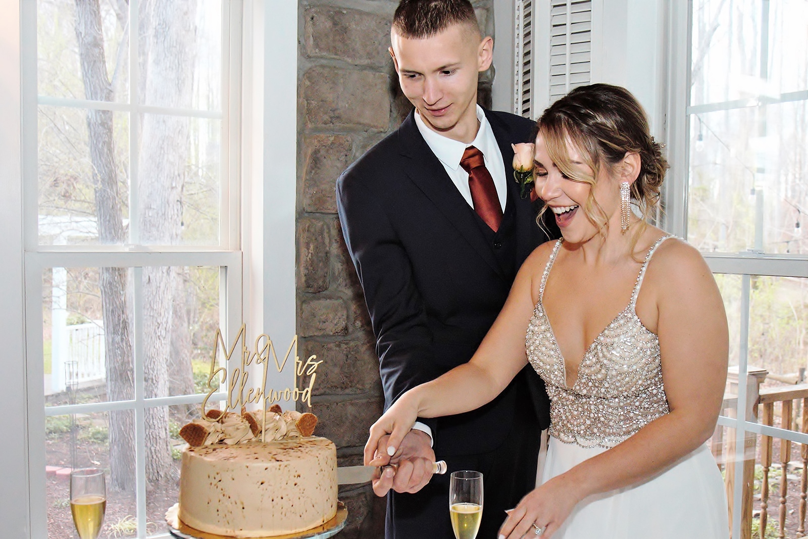 Newlyweds are cutting the cake -- the first sweet test of married life.