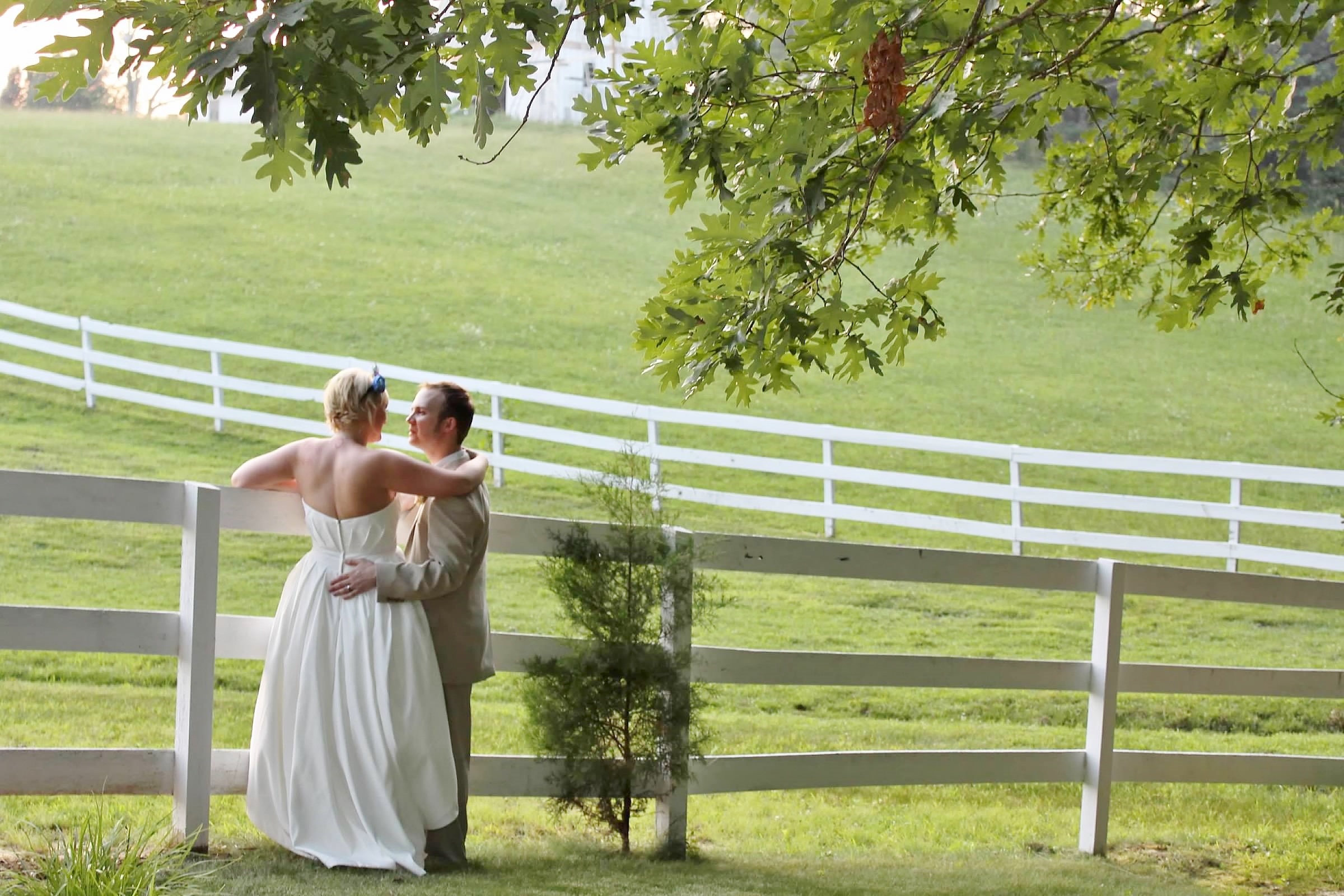 Bride and groom share tender moment alone.